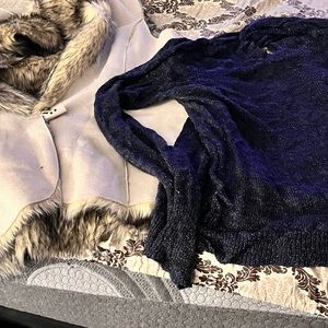 I am selling a faux suede, a faux, fur vest, and a sparkly blue sweater